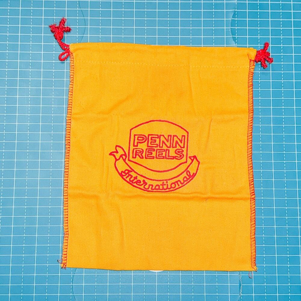 Penn Reels International Fishing Reel Drawstring Pouch Bag Yellow Red